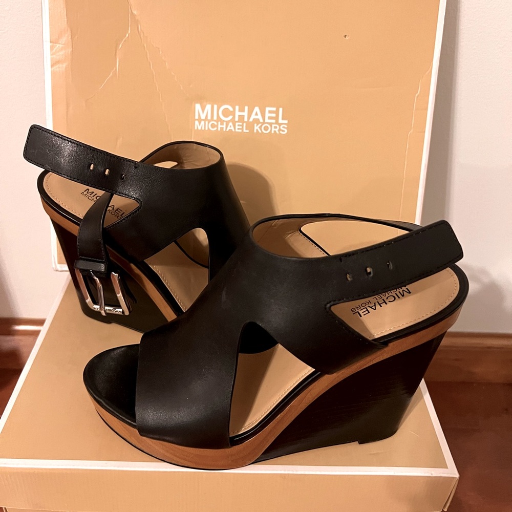 Micheal Kors Leather Wedge Slingback Black never worn in box size 7.5.